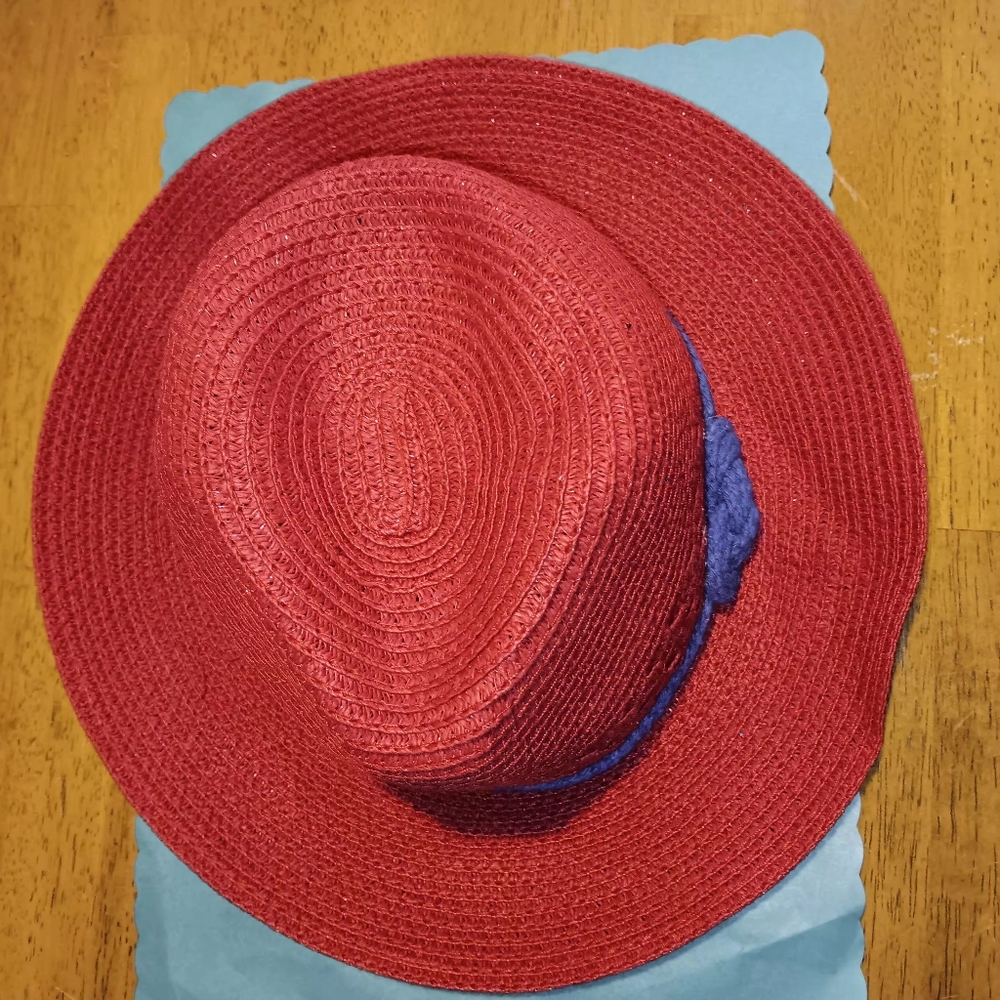Red Straw Packable Hat with Blue Accent Fold It Up Shake It Out And Your Ready